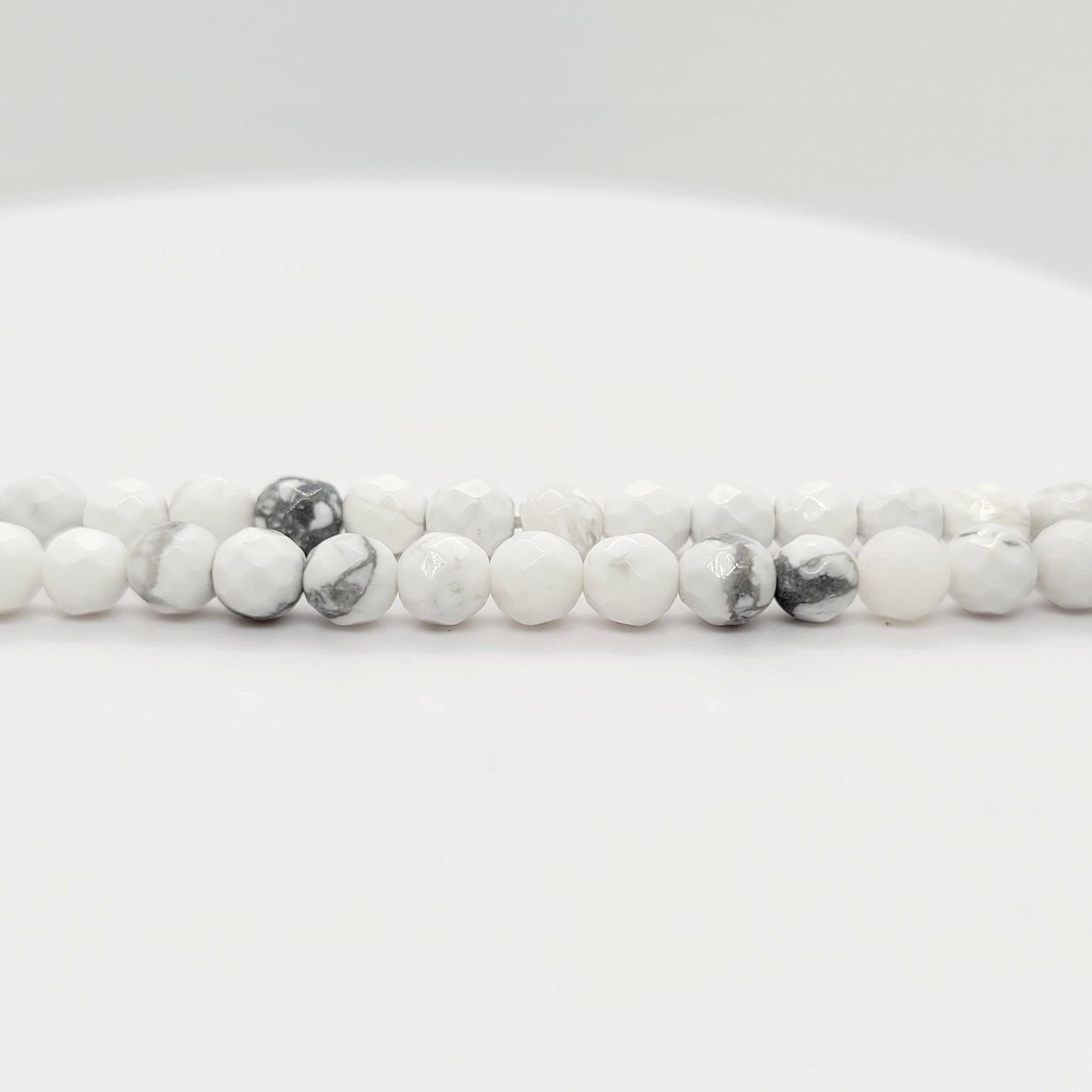 Howlite (White) - Faceted 4 mm
