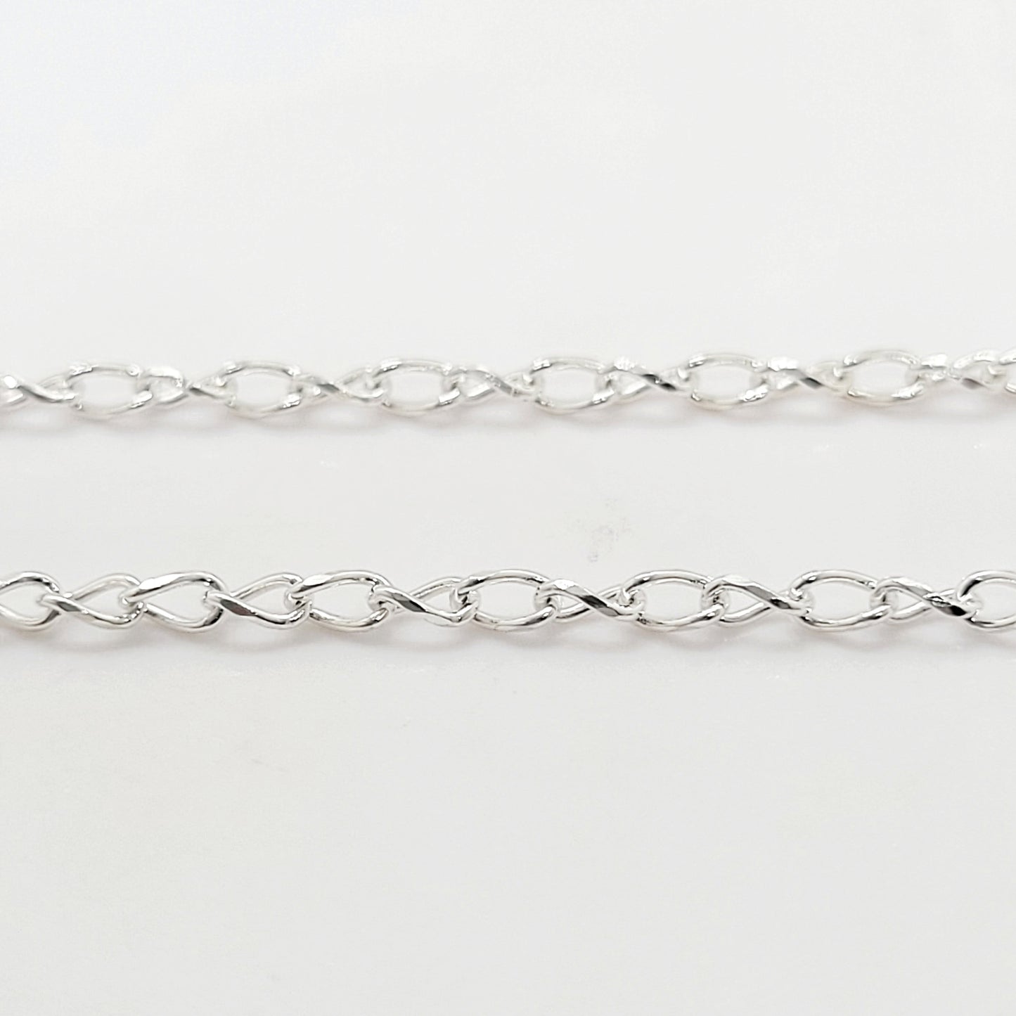 .925 Sterling Silver 2 mm Diamond Cut Twisted Oval Chain / By The Inch