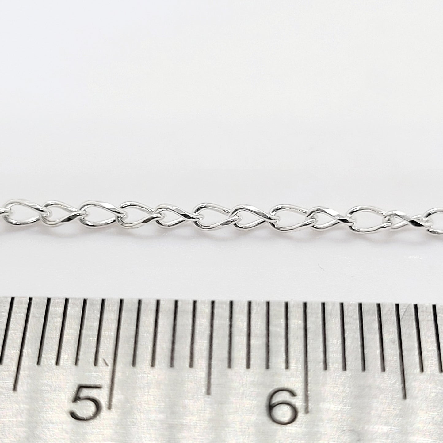 .925 Sterling Silver 2 mm Diamond Cut Twisted Oval Chain / By The Inch