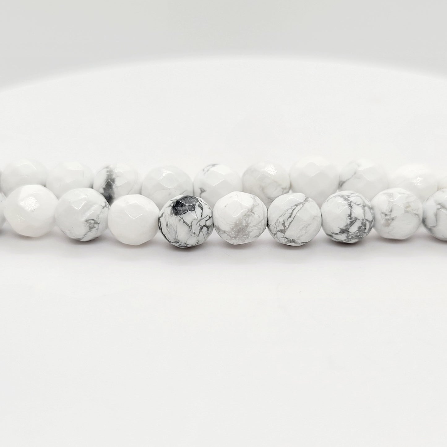 Howlite (White) - Faceted 6 mm