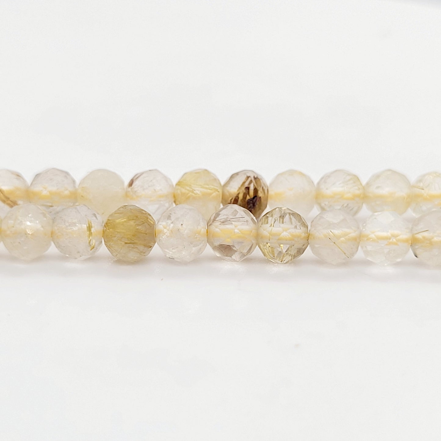 Quartz - Golden Rutilated (Faceted)  4-4.5 mm